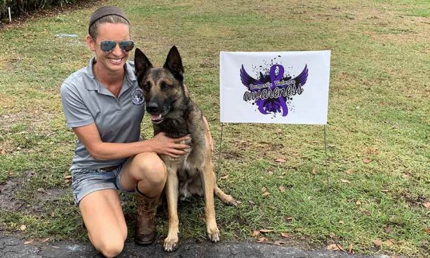 Paws Against Domestic Violence launches in Osceola, presents first two companion dogs