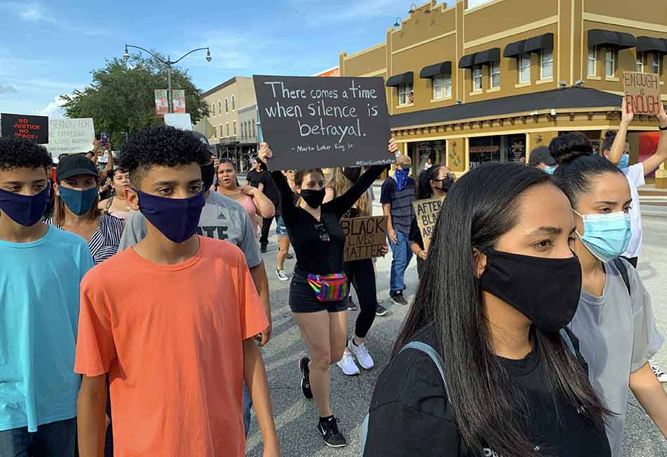 Police And Protesters March Side By Side In Kissimmee Vowing To End Racial Violence And Seek Justice