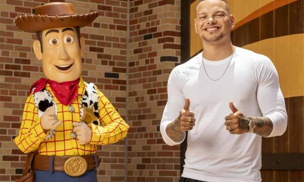 Country singer Kane Brown takes photo with Woody at Disney’s Hollywood Studios