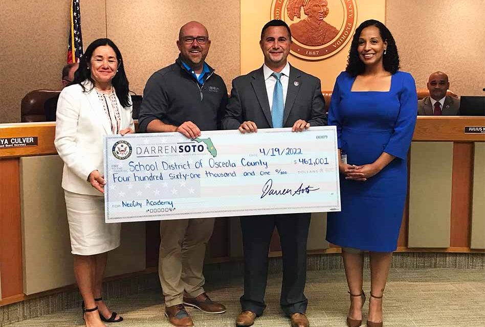 Florida Congressman Darren Soto presents $461,001 to NeoCity Academy at Osceola School Board Meeting