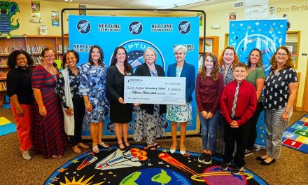 Commissioner Cheryl Grieb presents $15,000 check to Neptune Elementary to support “Leader in Me Program”