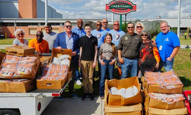 County Commissioners Arrington and Booth turn KVLS 4-H Livestock support into local charity donation