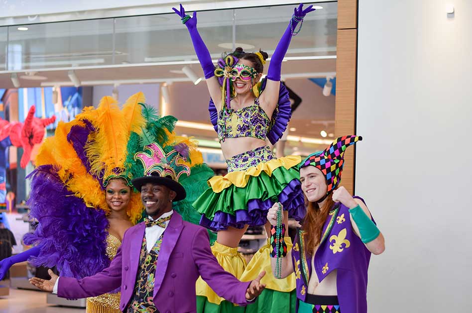 Universal Orlando surprises travelors with pop-up Mardi Gras celebration at Orlando International Airport