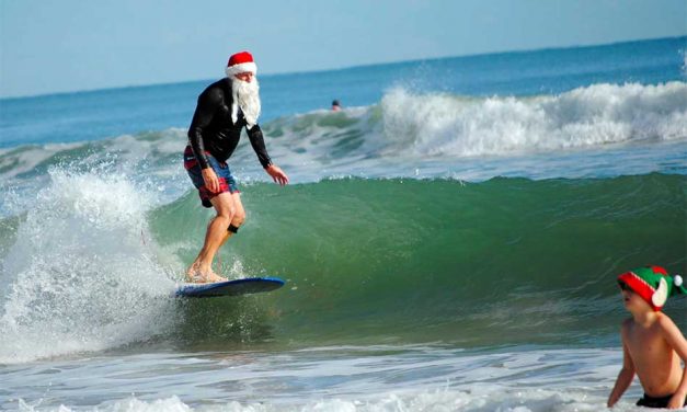 A Coastal Christmas Eve Morning Tradition: The Surfing Santas of Cocoa Beach
