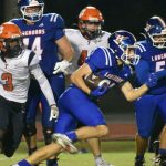 Tohopekaliga Tigers Capitalize on Turnovers to Top Harmony Longhorns 28-16 in District Clash