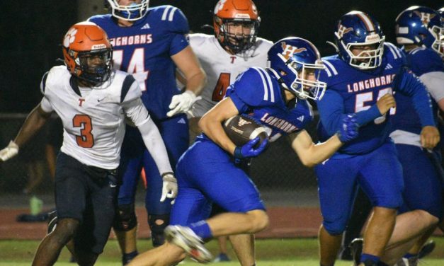 Tohopekaliga Tigers Capitalize on Turnovers to Top Harmony Longhorns 28-16 in District Clash