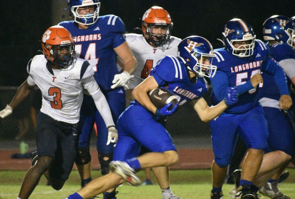 Tohopekaliga Tigers Capitalize on Turnovers to Top Harmony Longhorns 28-16 in District Clash