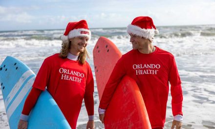 Record-Breaking Turnout for Surfing Santas, Sponsored by Orlando Health, as Thousands Take Over Cocoa Beach