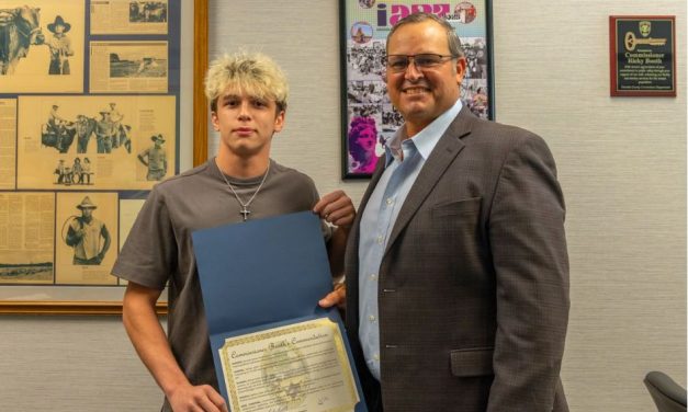 County Commissioner Ricky Booth Honors Harmony Wrestling Standout Nathan Lyttle Following Historic High School Career