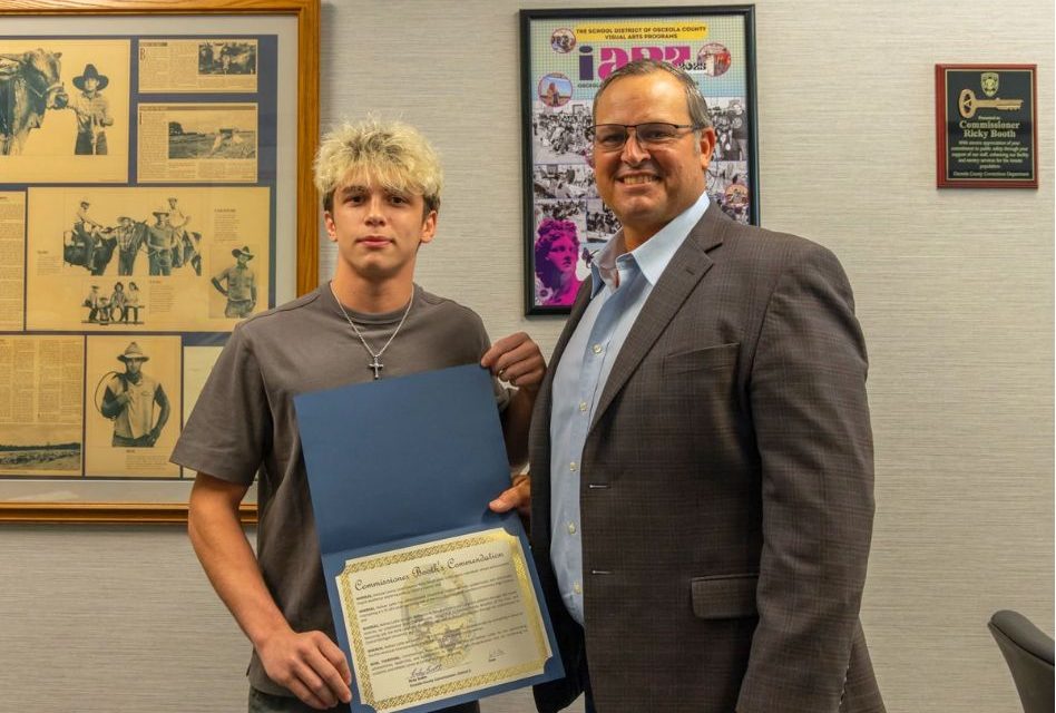County Commissioner Ricky Booth Honors Harmony Wrestling Standout Nathan Lyttle Following Historic High School Career